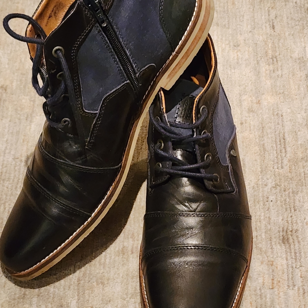 Steve Madden leather/ denim lace up boot with side zipper.